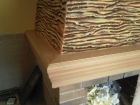 wooden frame above the fireplace-photo 1