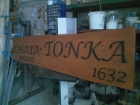 Wooden sign on the chat-photo1