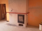 wooden shelf above the fireplace insert